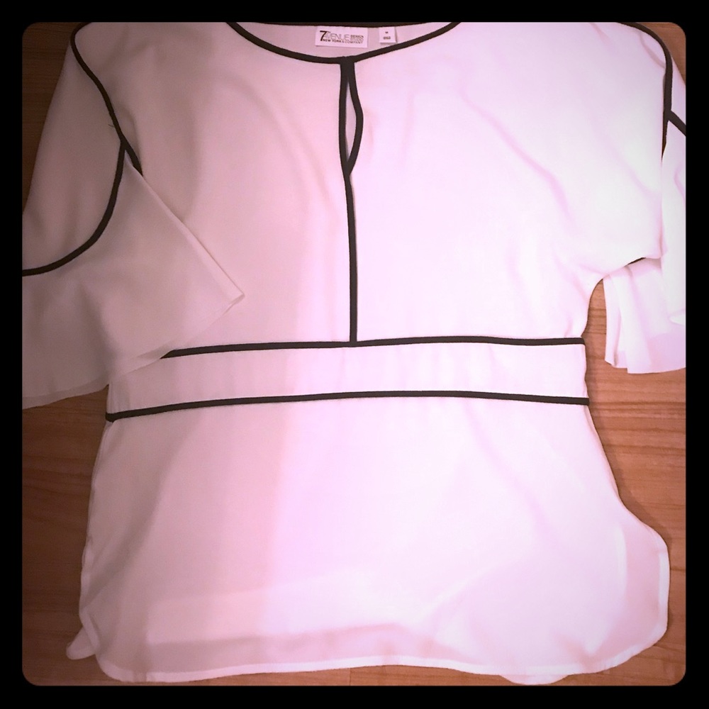 Blouse hasn't been worn.